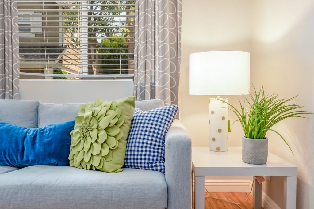 table lamp next to a sofa in a living room